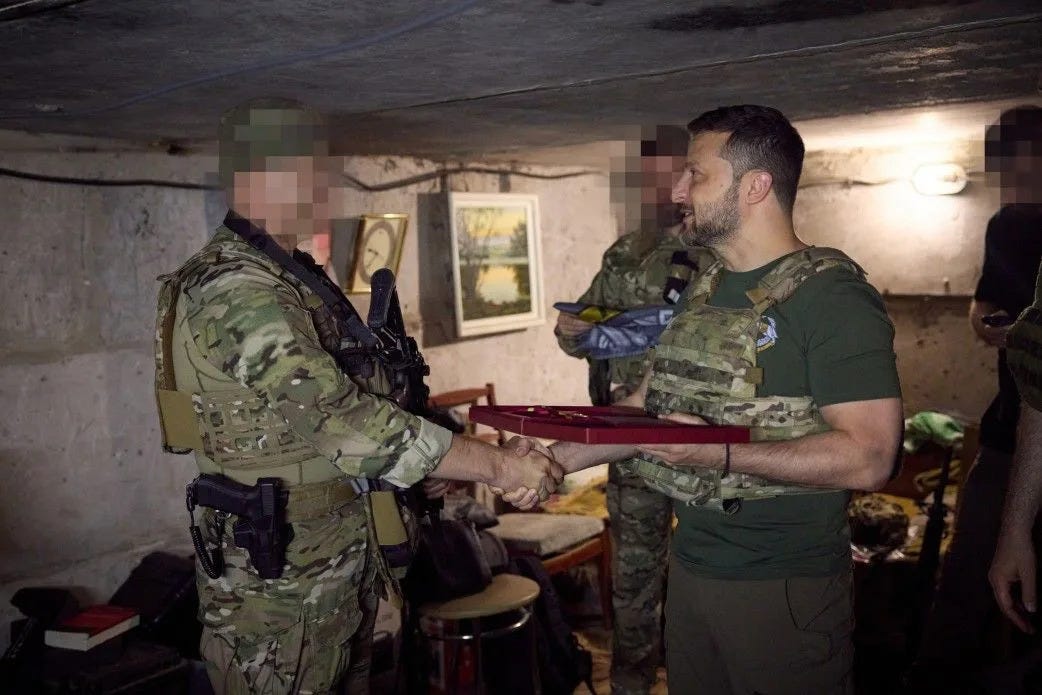 President Volodymyr Zelensky gives state awards to the Ukrainian military during a front-line visit in Donetsk Oblast on July 29, according to a statement shared by the Presidential Office. (Courtesy) President Volodymyr Zelensky gives state awards to the Ukrainian military during a front-line visit in Donetsk Oblast on July 29, according to a statement shared by the Presidential Office. (Courtesy)