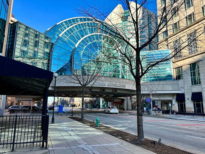 buildings, sidewalks, streets, clock, art