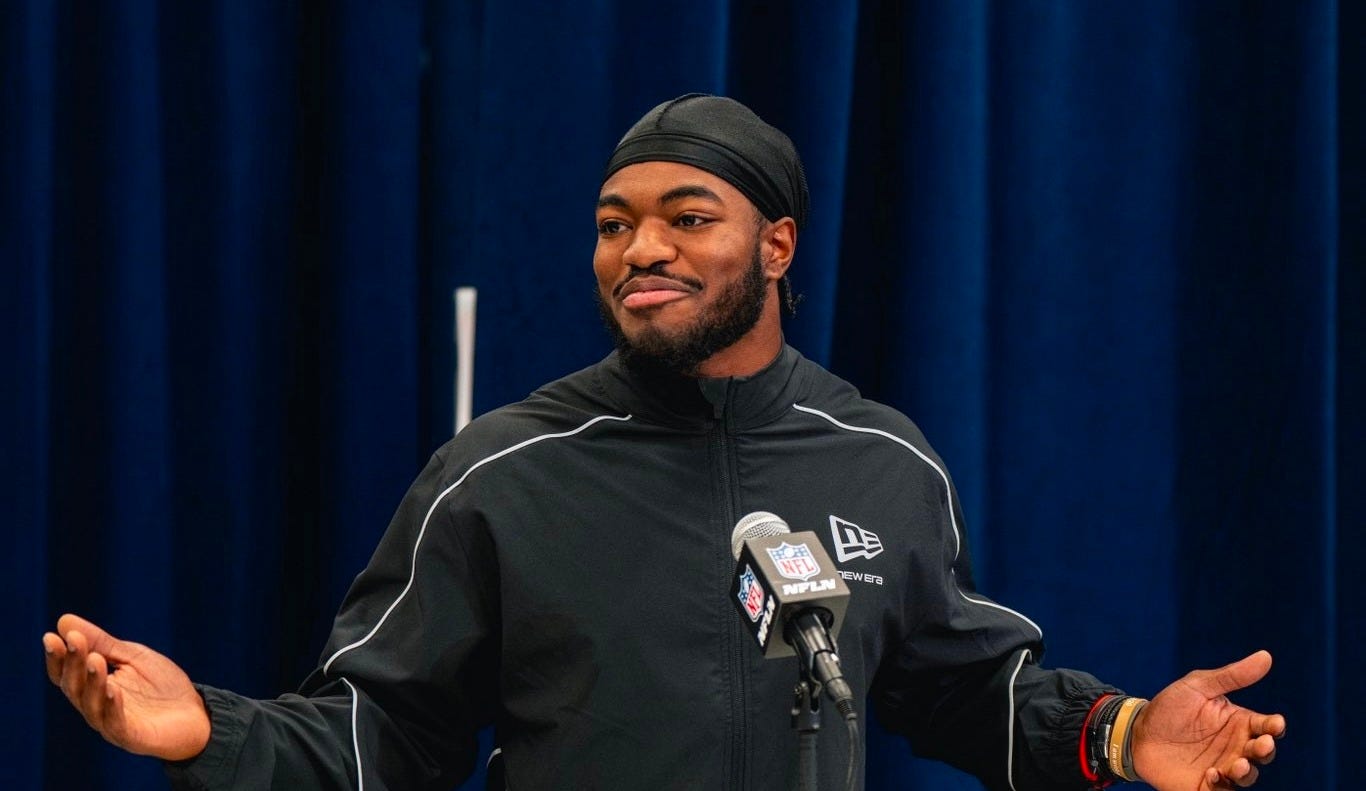 Wisconsin Badgers wide receiver Vinny Anthony talks at the podium at the NFL Scouting Combine.