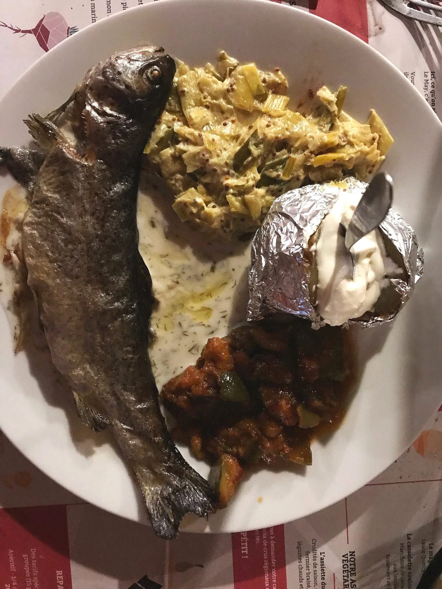  Grilled catch of the day with mixed vegetables and baked potato at local institution, Le May restaurant in Toulouse, France 