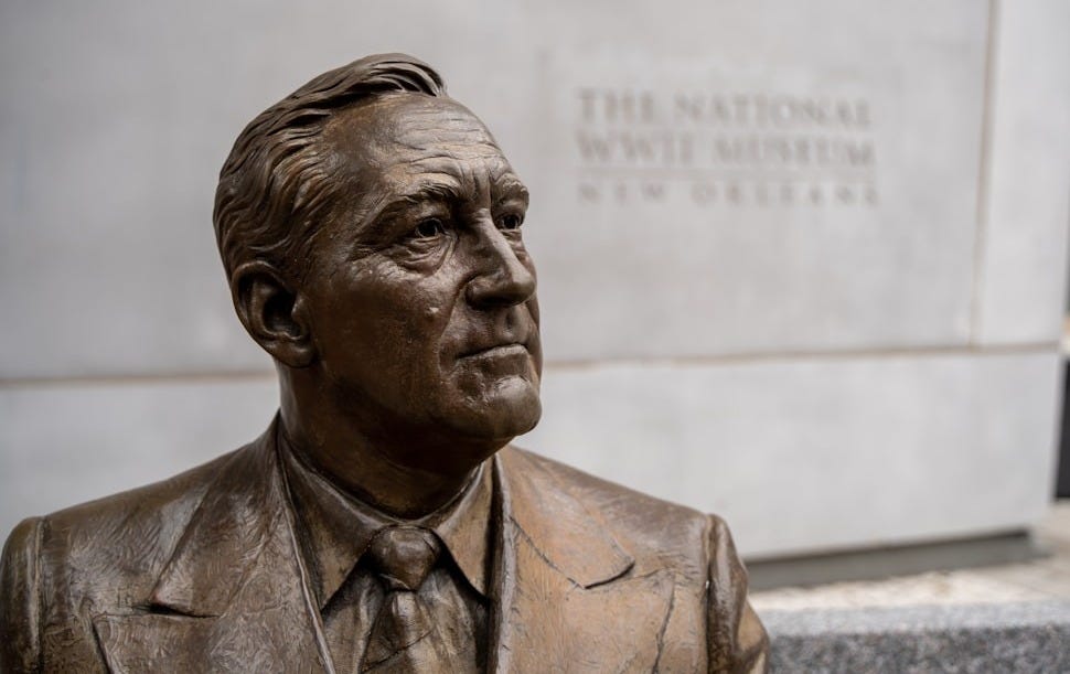 man in suit jacket statue