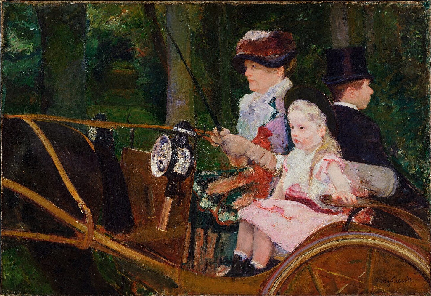 A woman in a dark hat holds the reins of a small carriage beside a little girl in a white hat, with a groom sitting behind them facing backward, trees blurred around them.