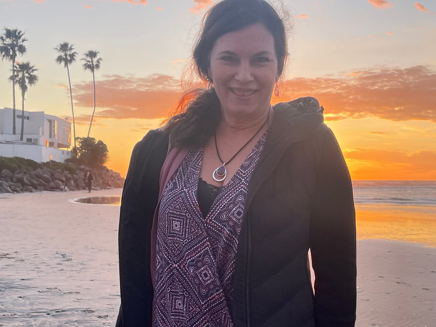 Maryann at the beach with orange sky
