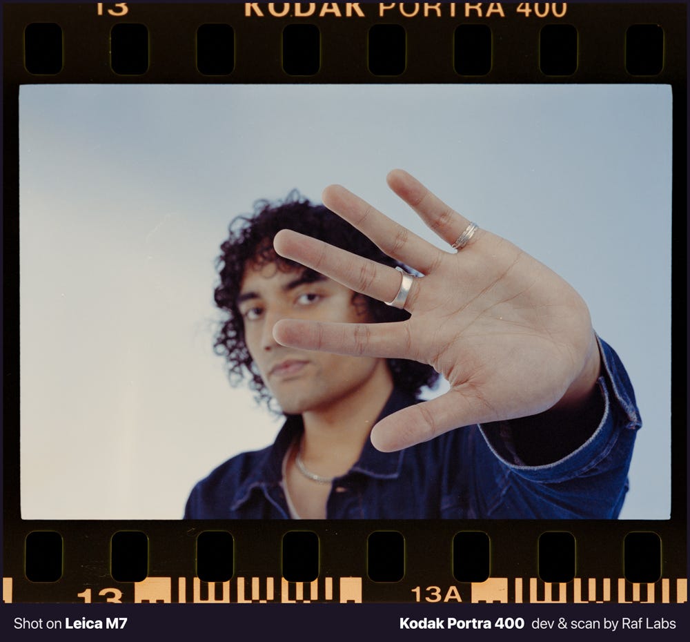 A man doing a hand gesture meaning stop. A man doing a hand gesture meaning stop.