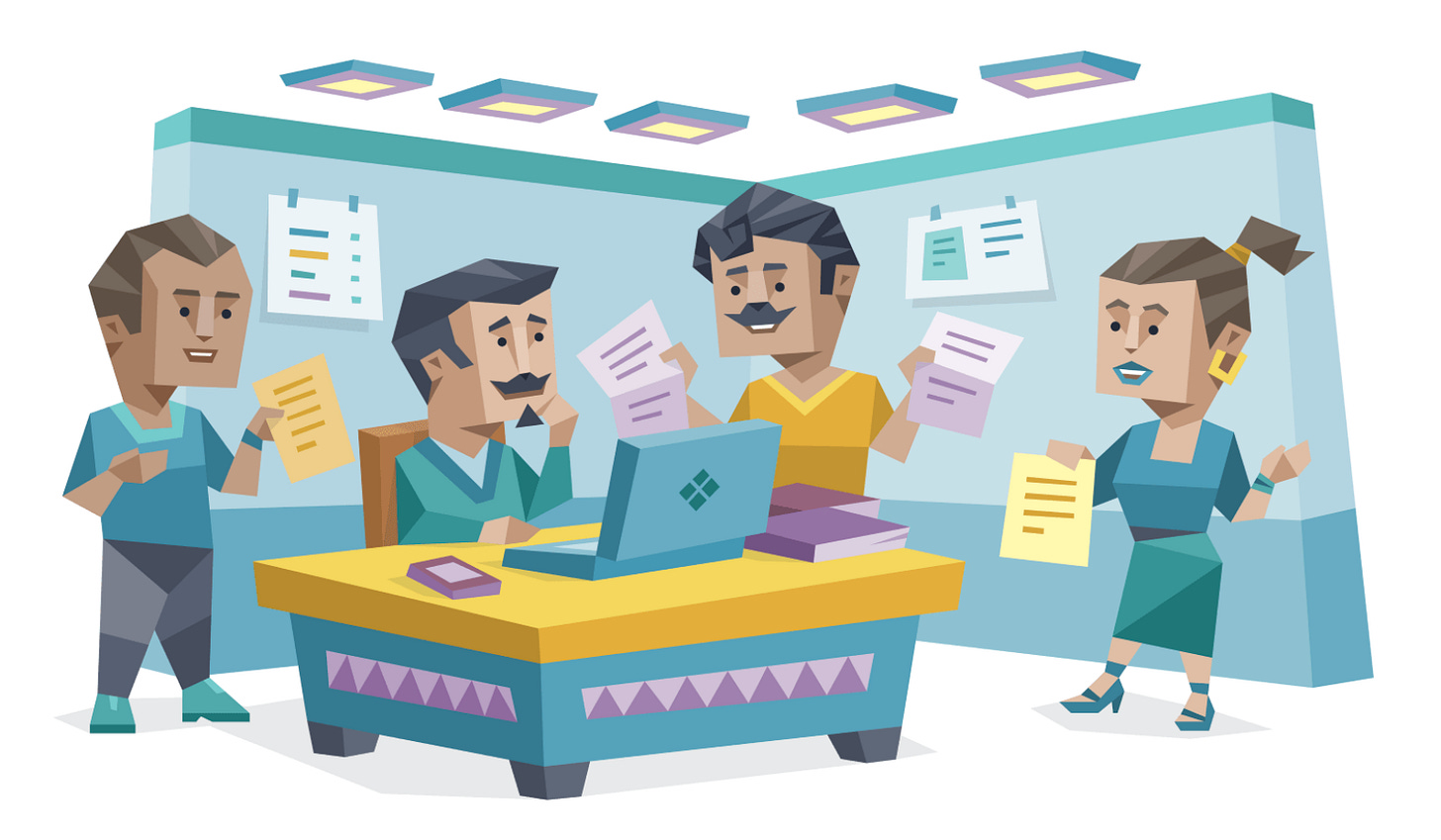 An ISFJ (Defender) man collaborating with three colleagues in an office setting. He sits at a desk with a laptop while his coworkers stand around holding documents and papers.