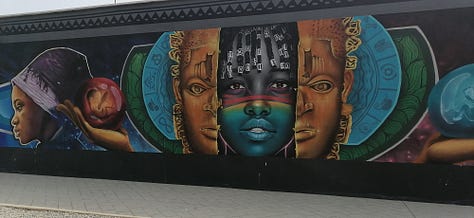 Pictures of the artwork on sale at the Marche des Arts de Cotonou, the Amazone statue, the Benin Congress building, and the second largest graffiti wall in the world
