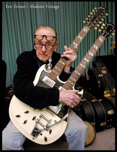 An old person holding a guitar

AI-generated content may be incorrect.