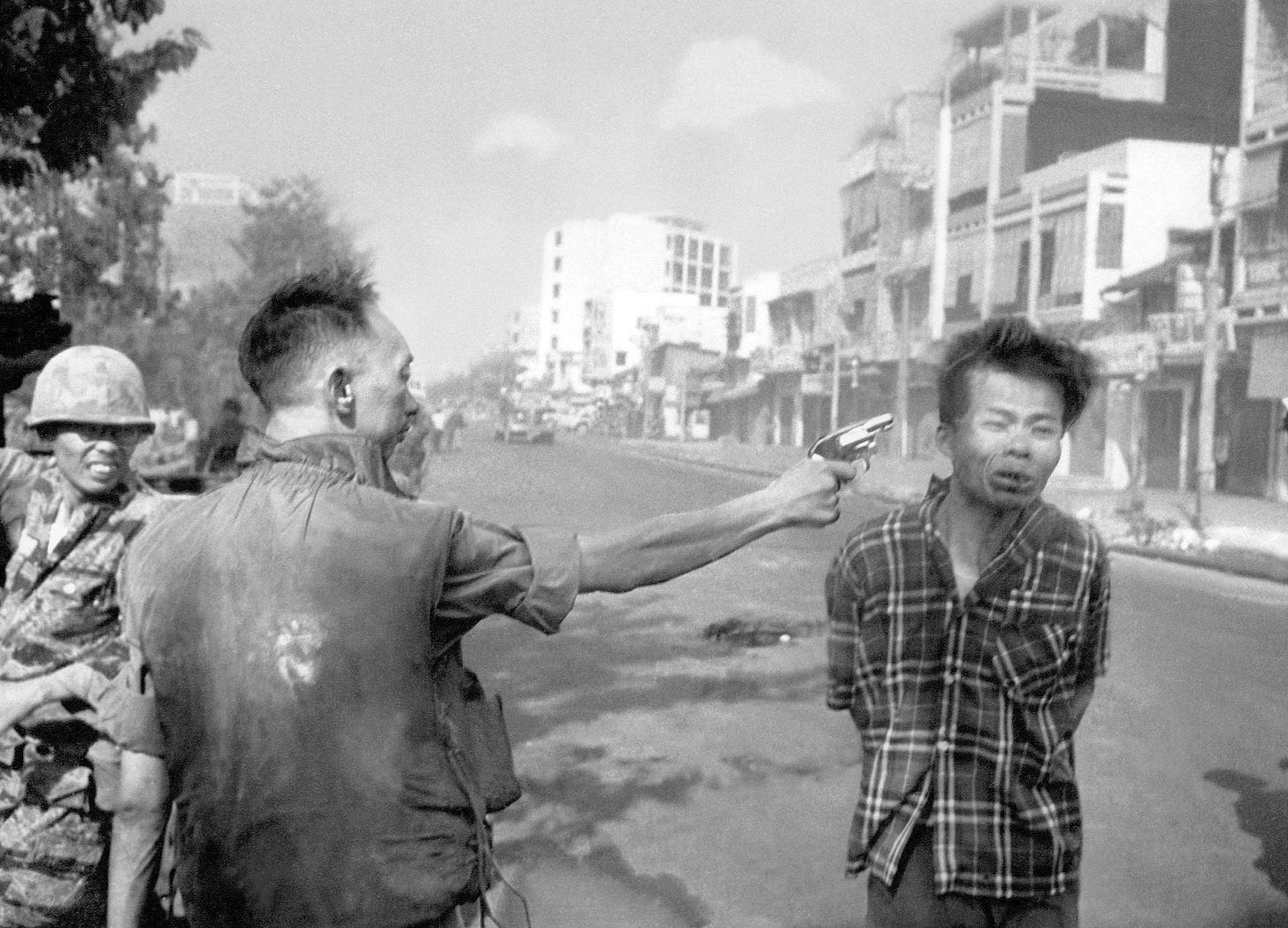Eddie Adams' photograph of General Nguyen Ngoc Loan executing Nguyen Van Lem, Saigon, February 1, 1968. Associated Press archive. Eddie Adams' photograph of General Nguyen Ngoc Loan executing Nguyen Van Lem, Saigon, February 1, 1968. Associated Press archive.