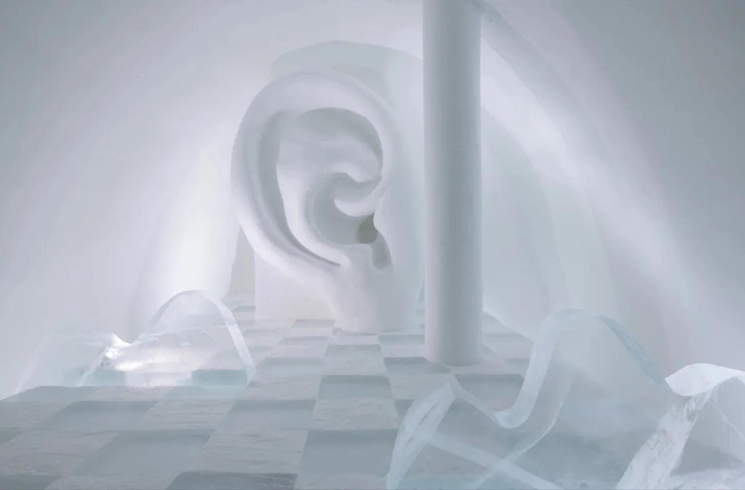 Intricate ice sculpture shaped like a human ear inside ICEHOTEL.
