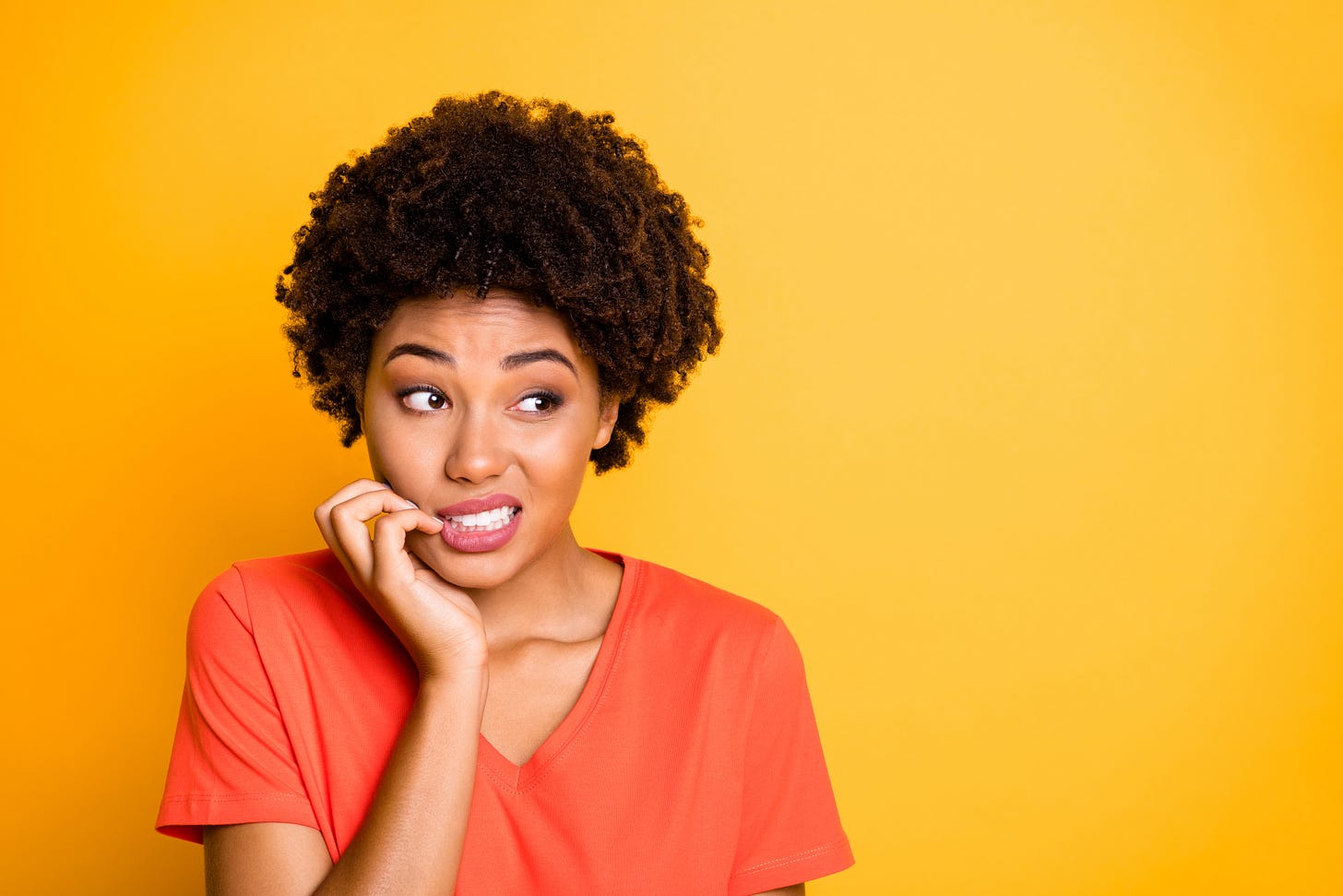Woman making a "whoops" face.