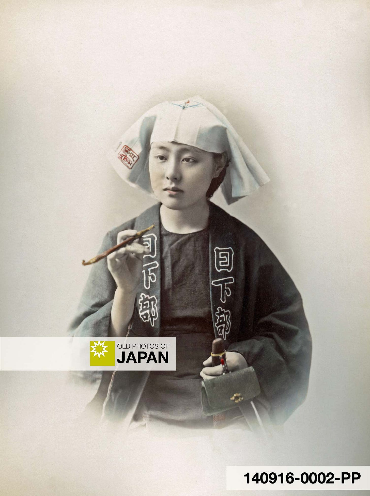 140916-0002-PP - A young Japanese woman dressed as a young man holding a kiseru pipe, 1890s 140916-0002-PP - A young Japanese woman dressed as a young man holding a kiseru pipe, 1890s
