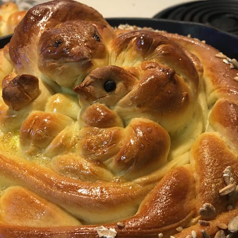 Several photos of challah that I’ve made for Shabbat Shirah in the shape of birds in a nest.