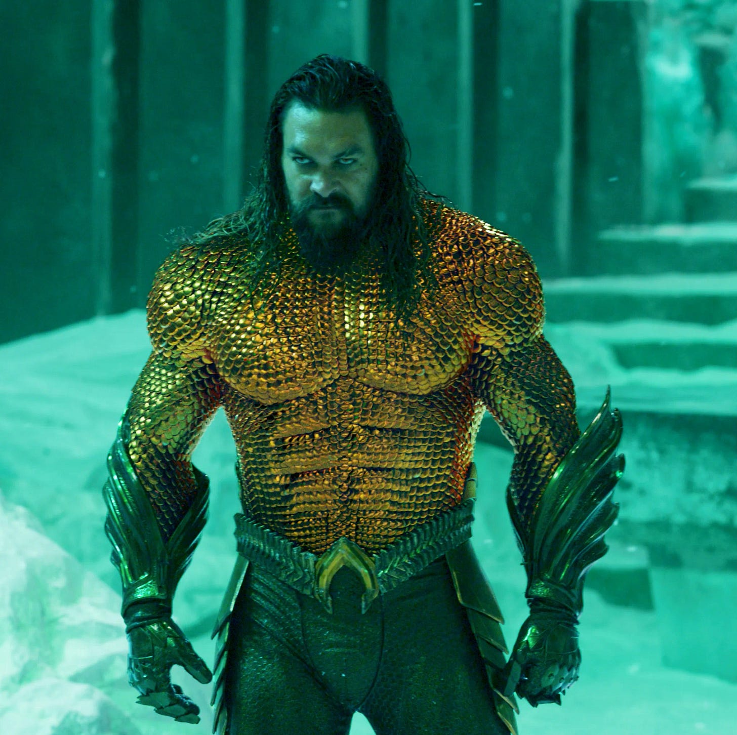 Aquaman looking glowery in ridiculous orange and green armor