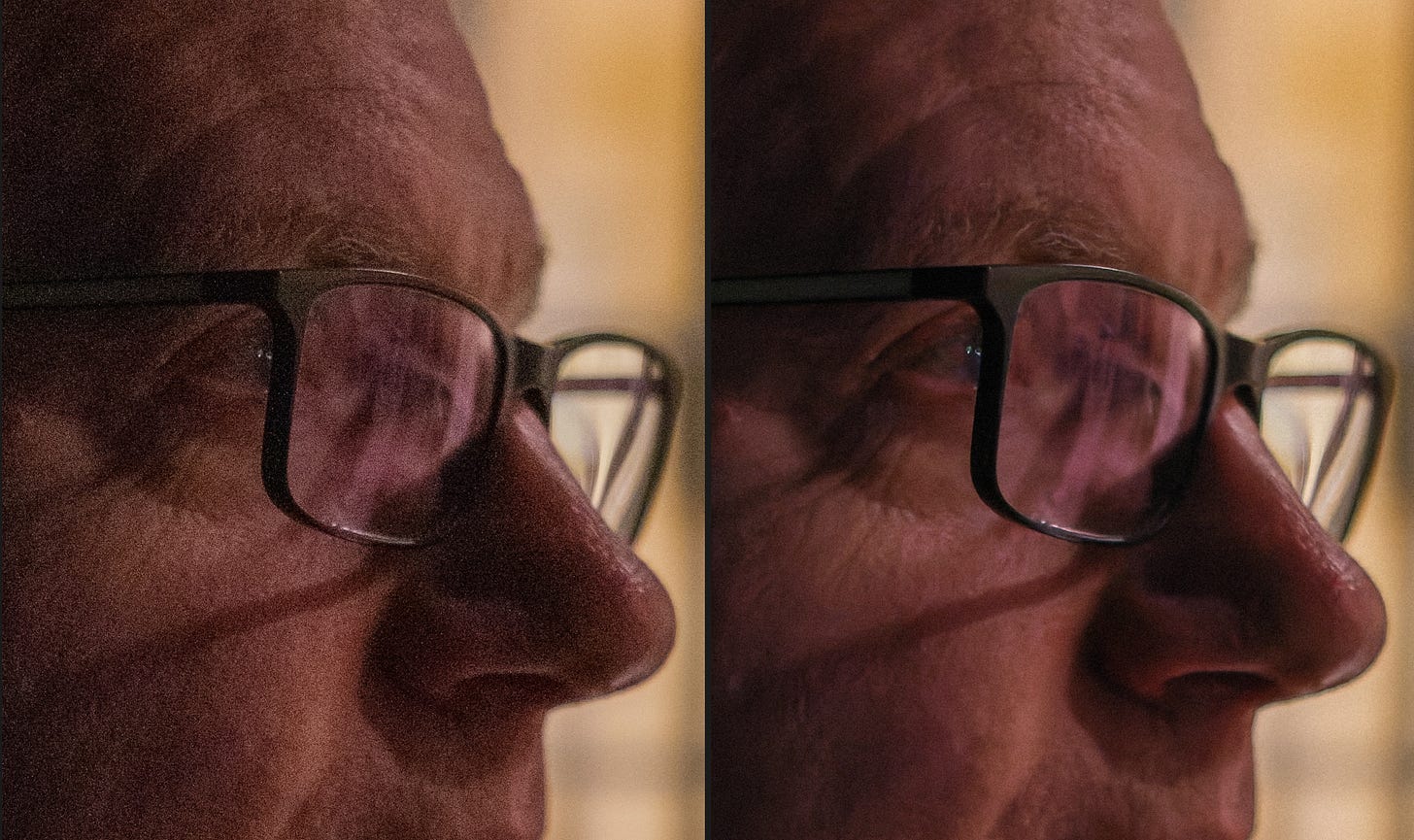 Side-by-side comparison of a zoomed in picture of a man, with just his nose, glasses, and forehead visible. The left image exhibits more digital noise than the processed image on the right. Side-by-side comparison of a zoomed in picture of a man, with just his nose, glasses, and forehead visible. The left image exhibits more digital noise than the processed image on the right.