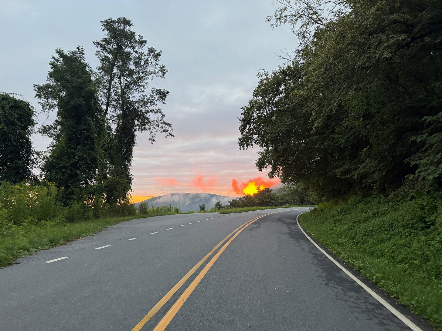 Firey sunrise on the Skyline Drive as I rode up to the second overlook Firey sunrise on the Skyline Drive as I rode up to the second overlook