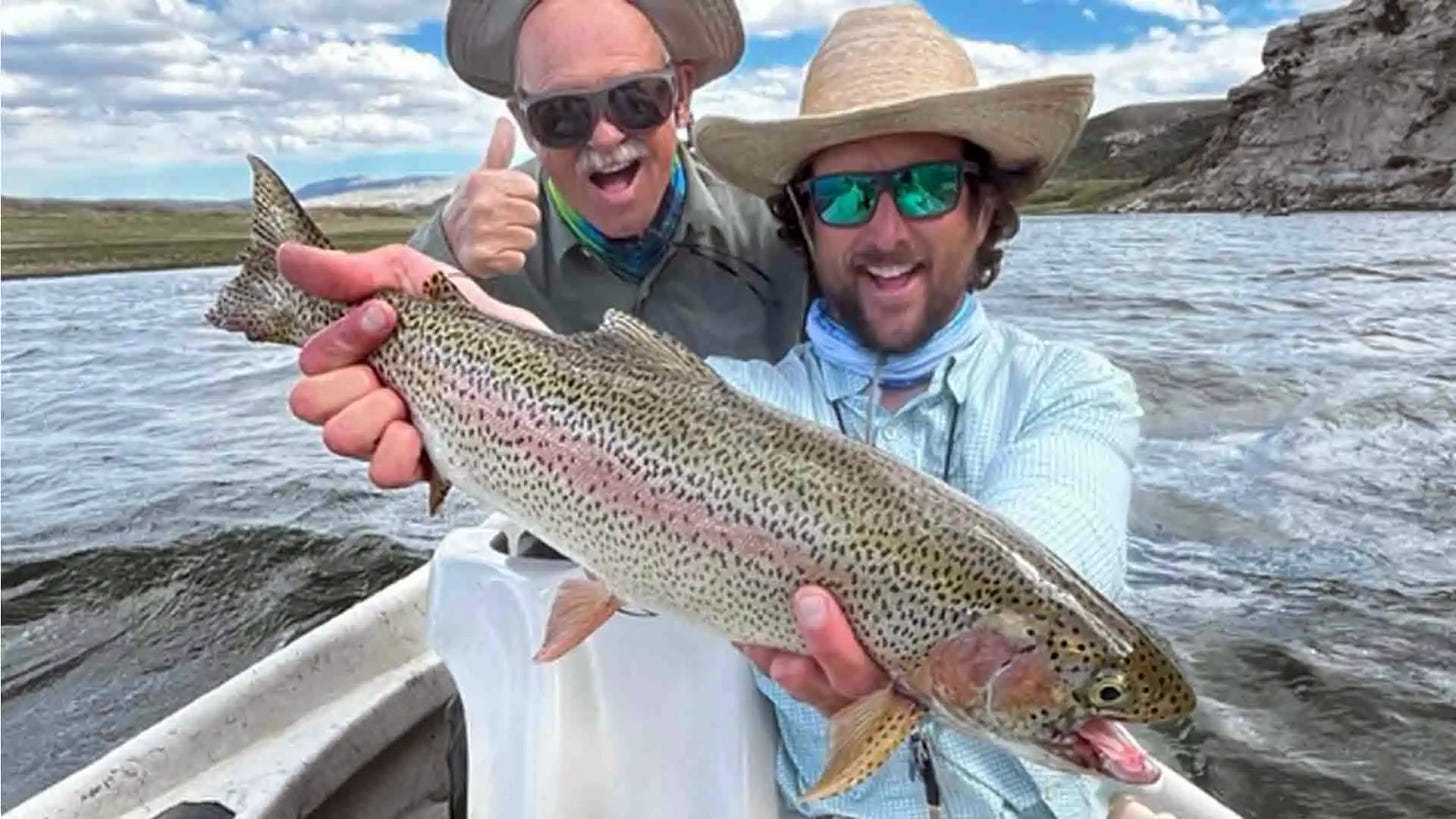 Guide and Angler with Large Rainbow Trout