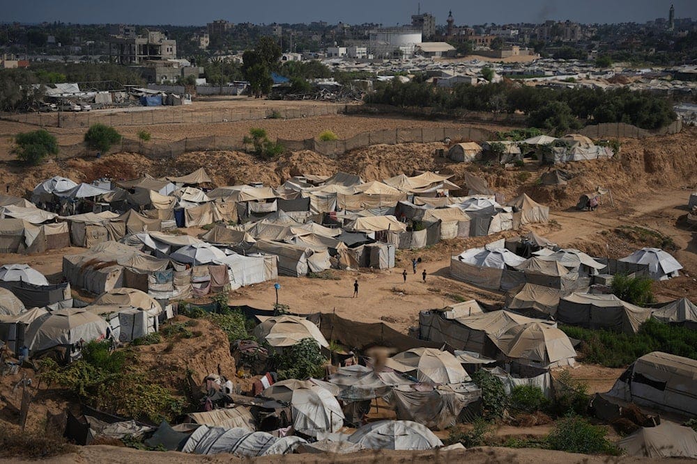 Palestinian children play in an open area at a makeshift camp for displaced people in Deir al-Balah, central Gaza Strip, Friday, Aug. 7, 2026 (AP) Palestinian children play in an open area at a makeshift camp for displaced people in Deir al-Balah, central Gaza Strip, Friday, Aug. 7, 2026 (AP)