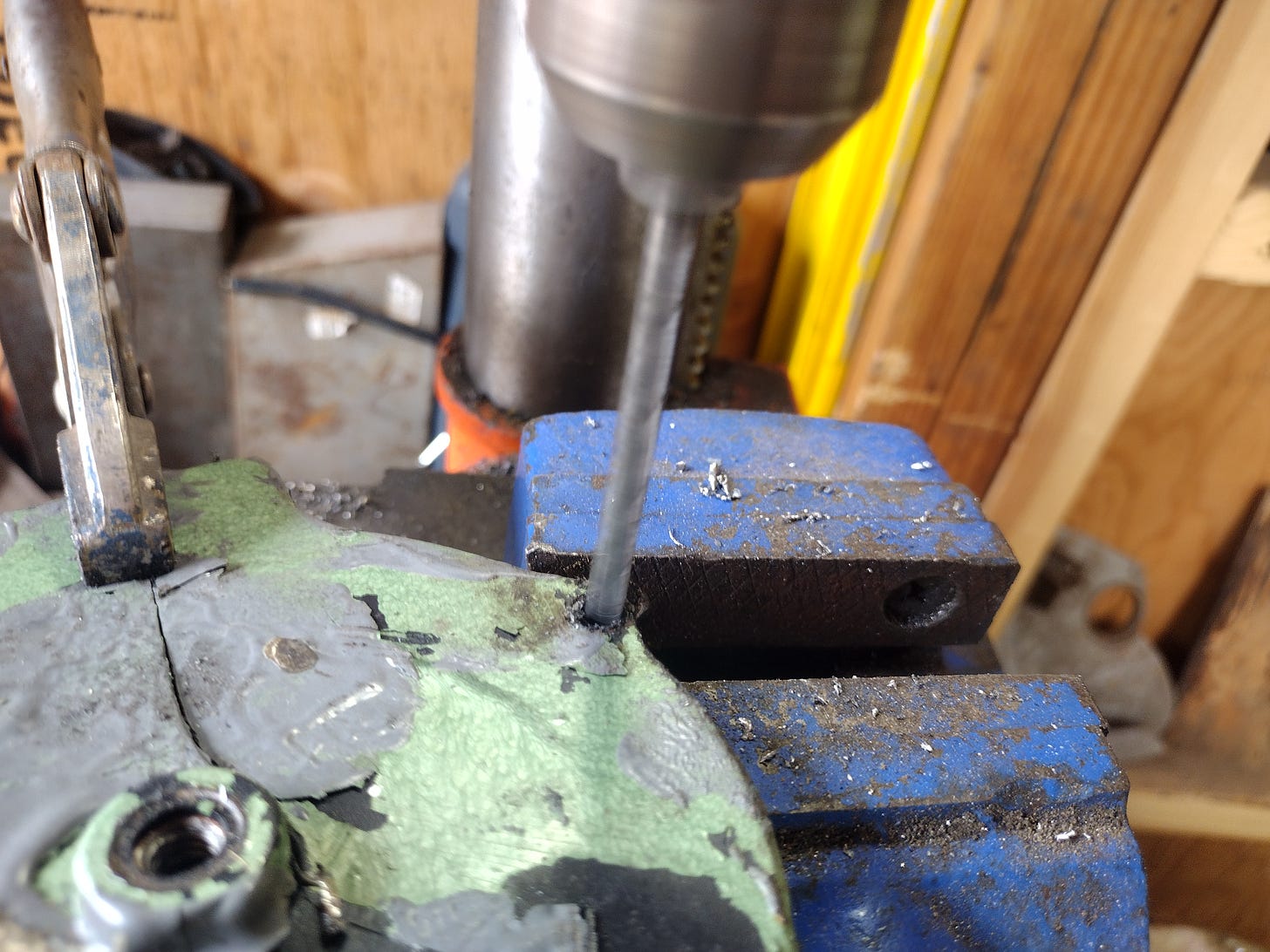 Drilling out the holes.