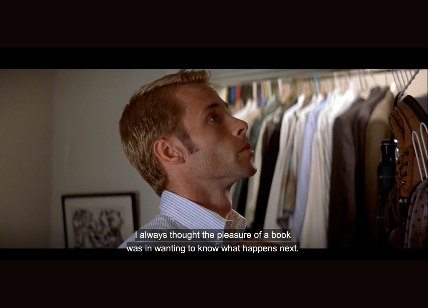 Scene from Memento with the main character saying: "I always thought the pleasure of a book was in wanting to know what happens next."