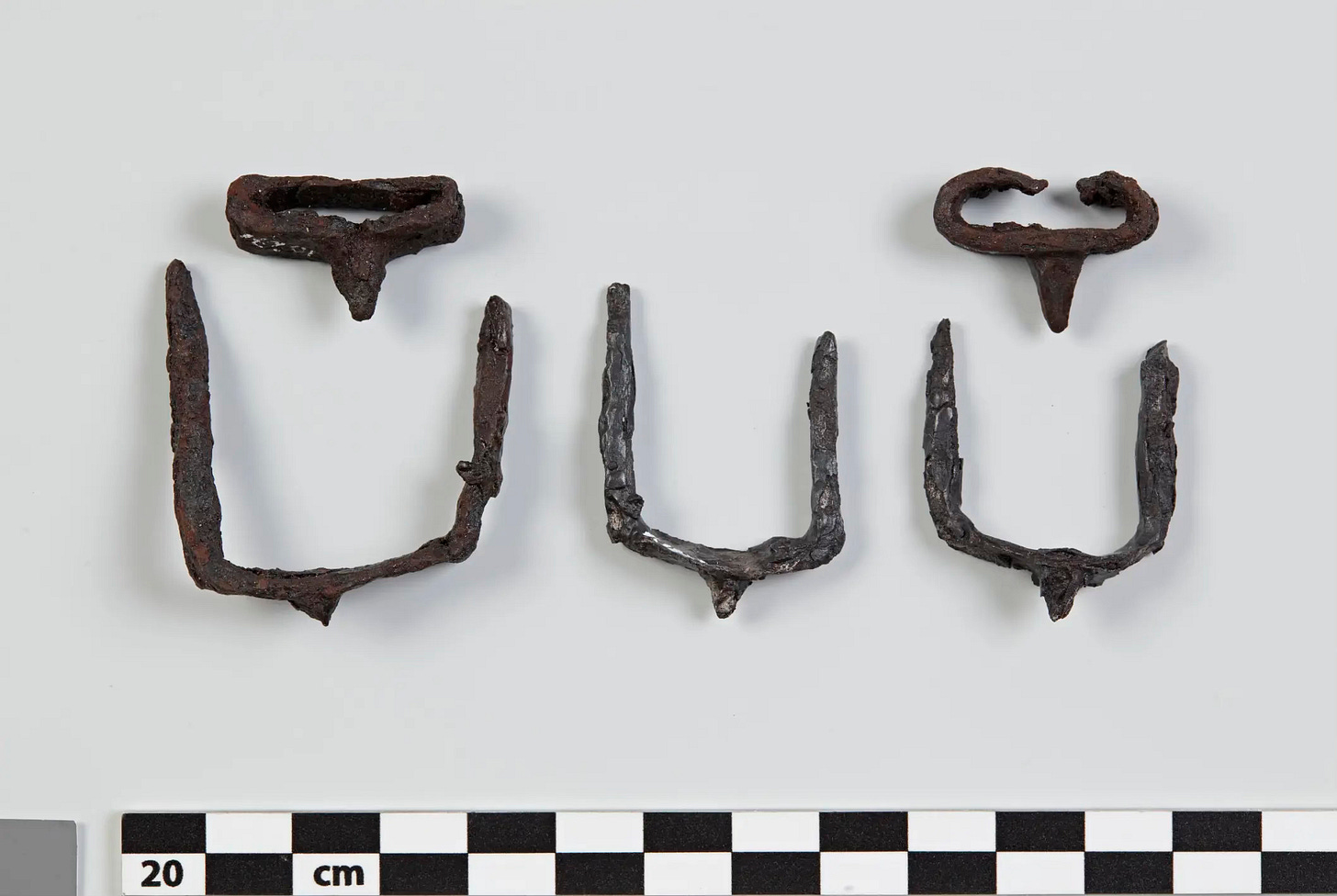 Horse ice grips from the Viking Age. (Photo: Olav Heggø / Museum of Cultural History)