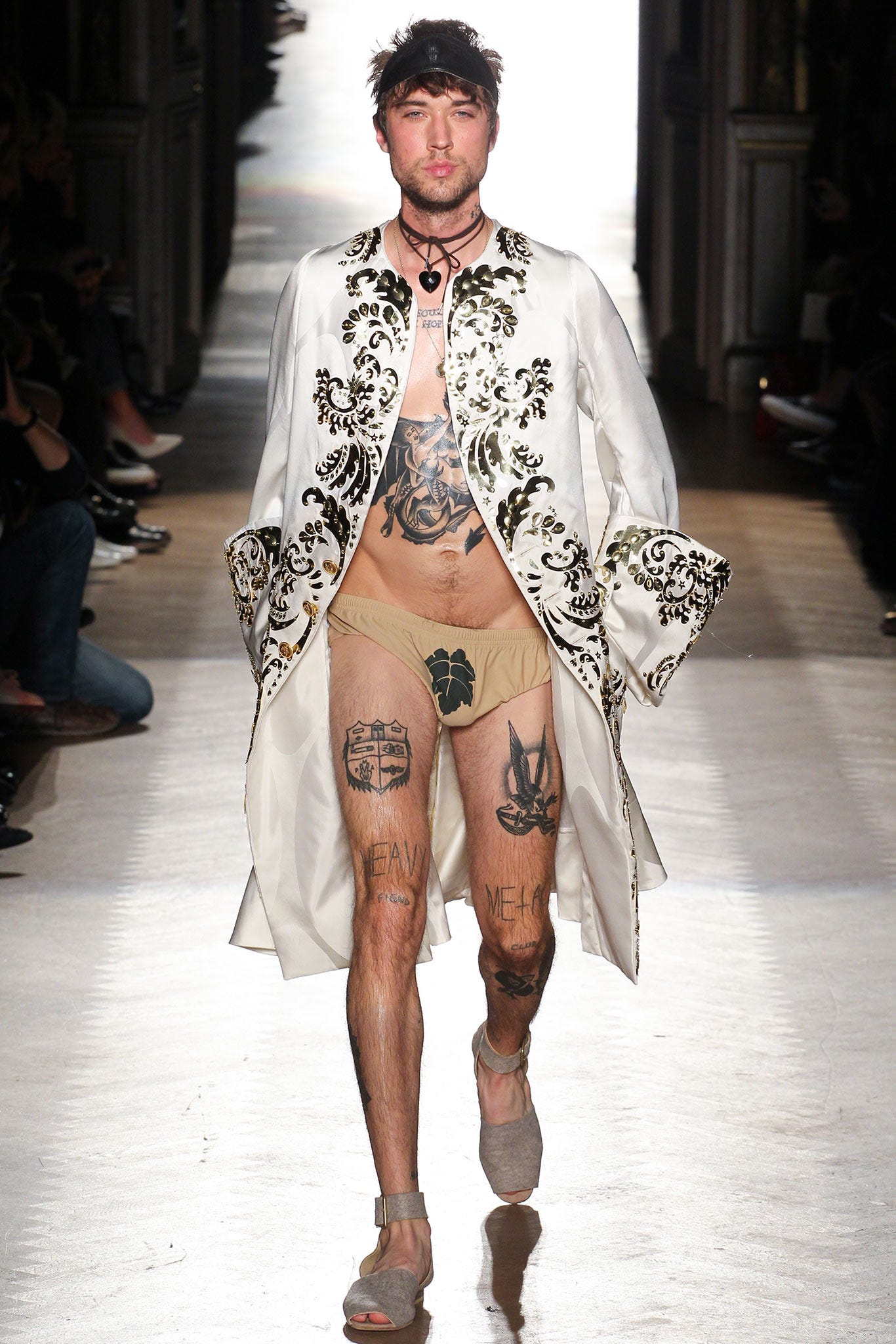 Image may contain Skin Human Person Clothing Apparel Tattoo Shoe and Footwear