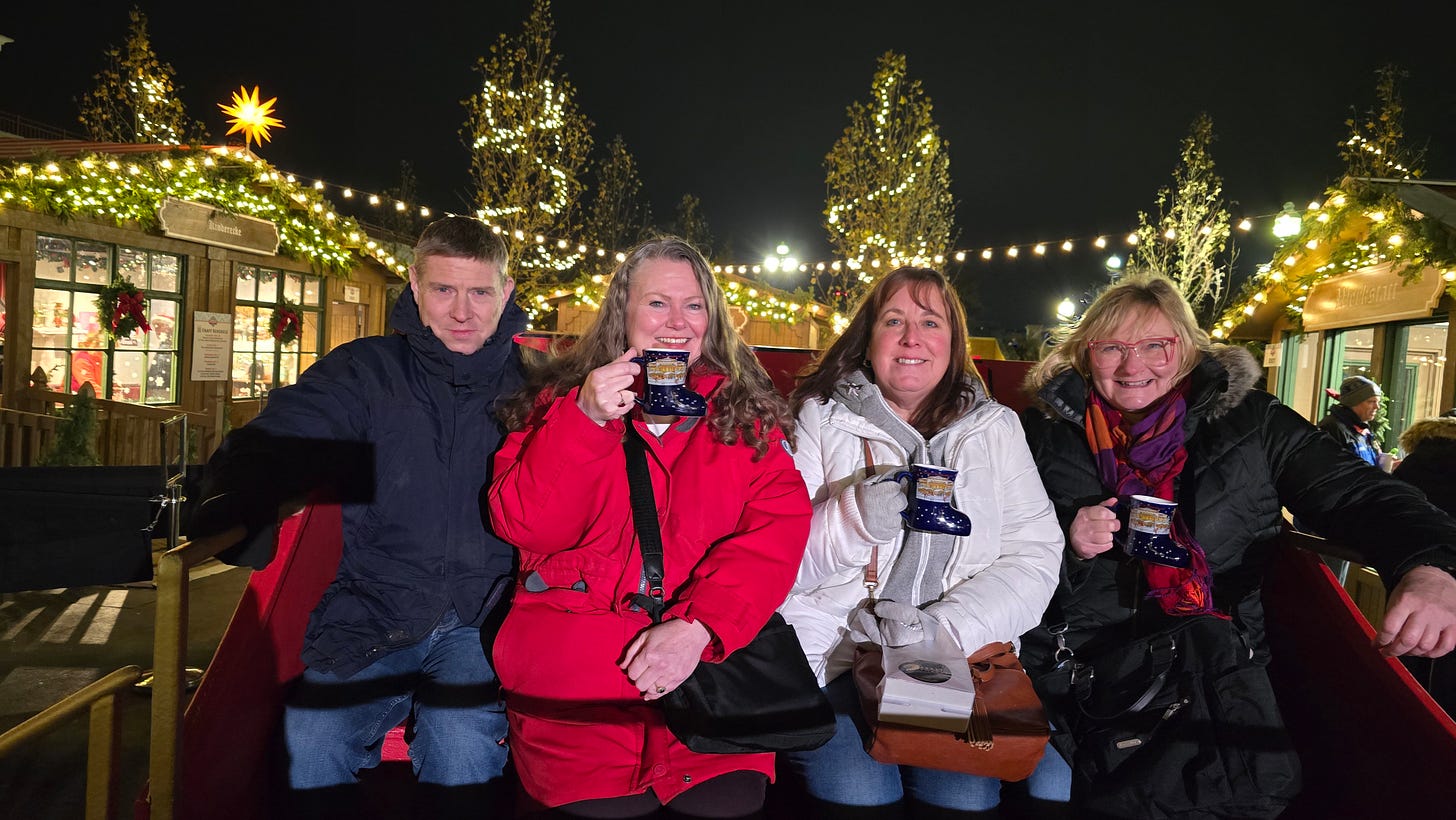 Theresa Goodrich with friends and brother in sleigh at the Carmel Christkindlmarket