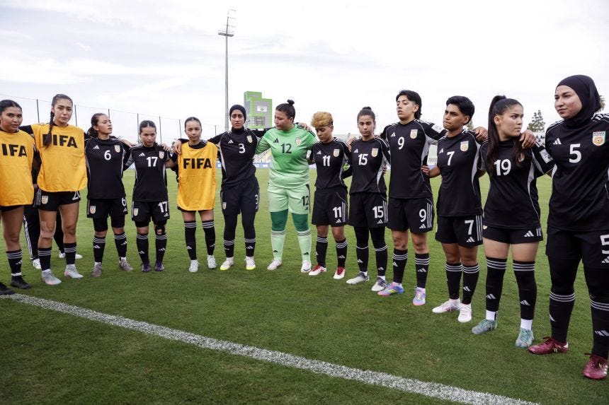 Afghanistan's players prepare to compete in the FIFA Unites Women's Series 2025 match between Afghan Women United and Chad in Berrechid, Morocco, on October 26, 2025.