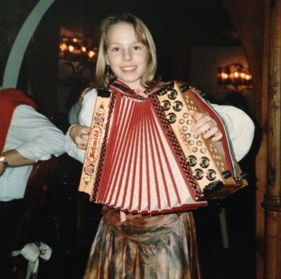 At nine years old, me with my Styrian accordion. © Author