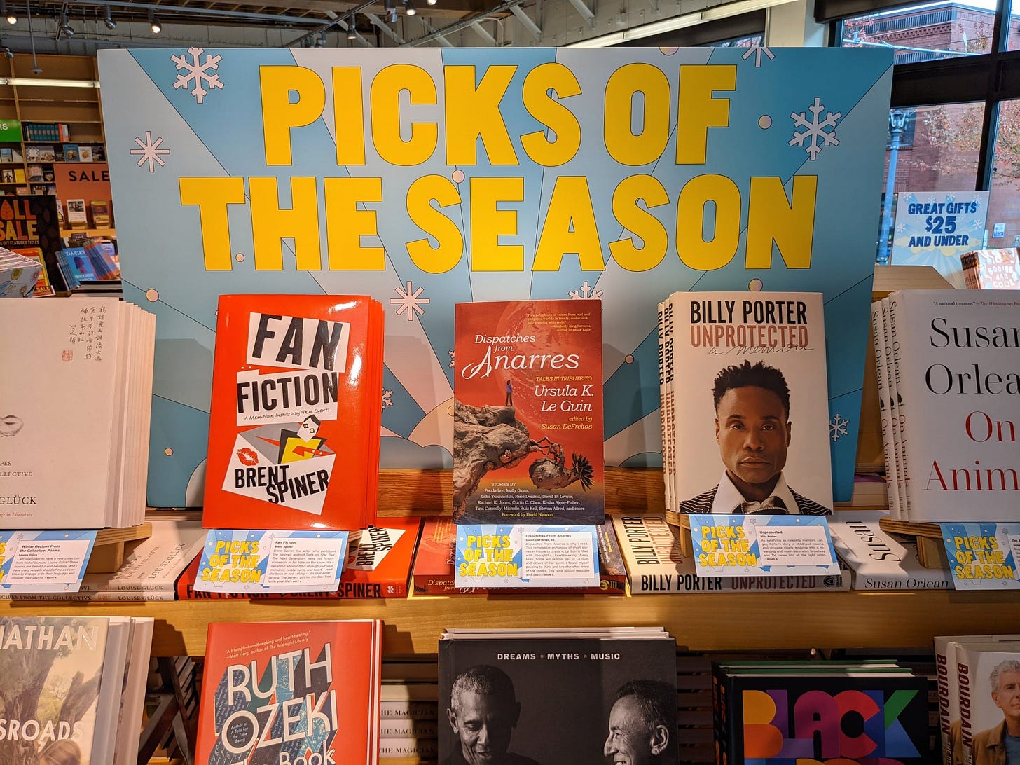 PICKS OF THE SEASON display at a bookstore with Dispatches from Anarres, a red otherworldly cover, in the center. 