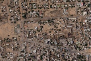 In this satellite photo provided by Planet Labs PBC, the area around the headquarters of the Sudanese military's 6th Division in el-Fasher, Sudan, is seen Sunday, Oct. 26, 2025. (Planet Labs PBC via AP)