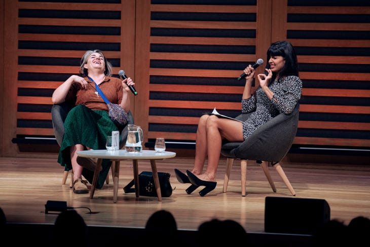 Things to do in London today: two women on stage, each holding a microphone and laughing Things to do in London today: two women on stage, each holding a microphone and laughing