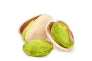 Pistachio nuts isolated on white background