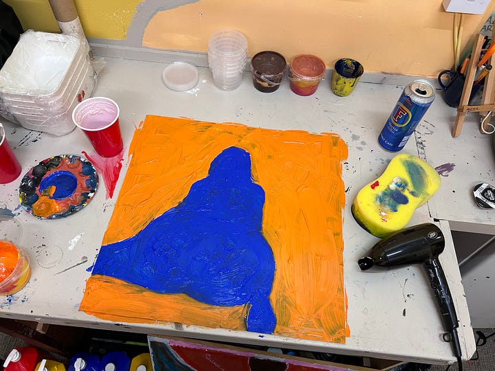 Orange and blue figurative abstract paintings.