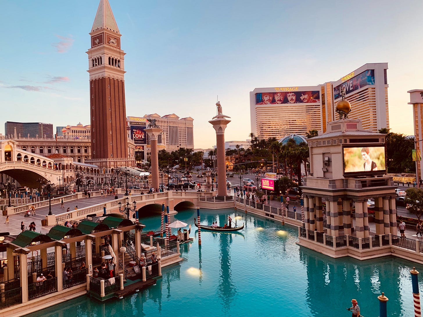 Venetian Hotel overlooking the canal outside showing the Mirage hotel in view Venetian Hotel overlooking the canal outside showing the Mirage hotel in view