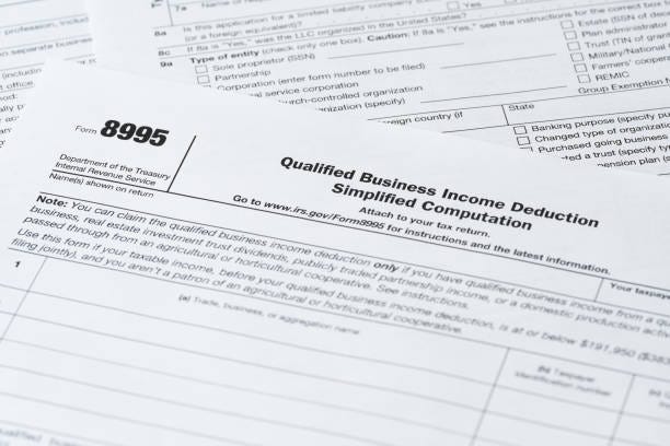 Form 8995, Qualified Business Income Deduction Simplified Worksheet, IRS Tax Document Close-Up Form 8995, Qualified Business Income Deduction Simplified Worksheet, IRS Tax Document Close-Up QBI Deduction stock pictures, royalty-free photos & images Form 8995, Qualified Business Income Deduction Simplified Worksheet, IRS Tax Document Close-Up Form 8995, Qualified Business Income Deduction Simplified Worksheet, IRS Tax Document Close-Up QBI Deduction stock pictures, royalty-free photos & images
