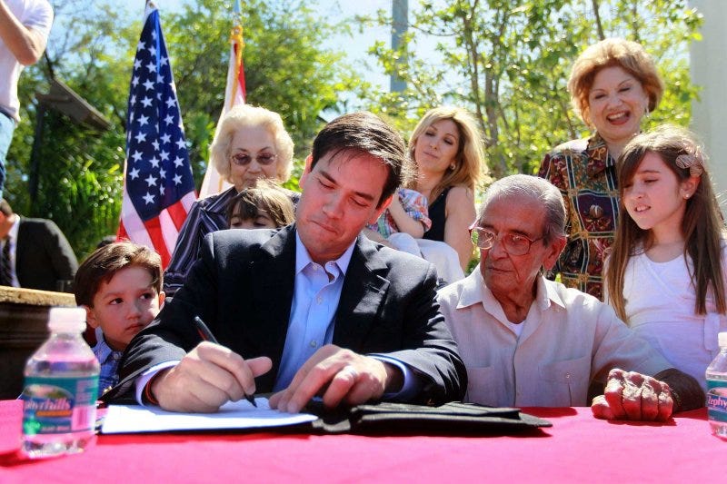 Marco Rubio with his son Anthony, father Mario, and daughter Amanda, as he signs official documents to qualify as a Republican candidate for the U.S. Senate in Miami, April 27, 2010. Marco Rubio with his son Anthony, father Mario, and daughter Amanda, as he signs official documents to qualify as a Republican candidate for the U.S. Senate in Miami, April 27, 2010.