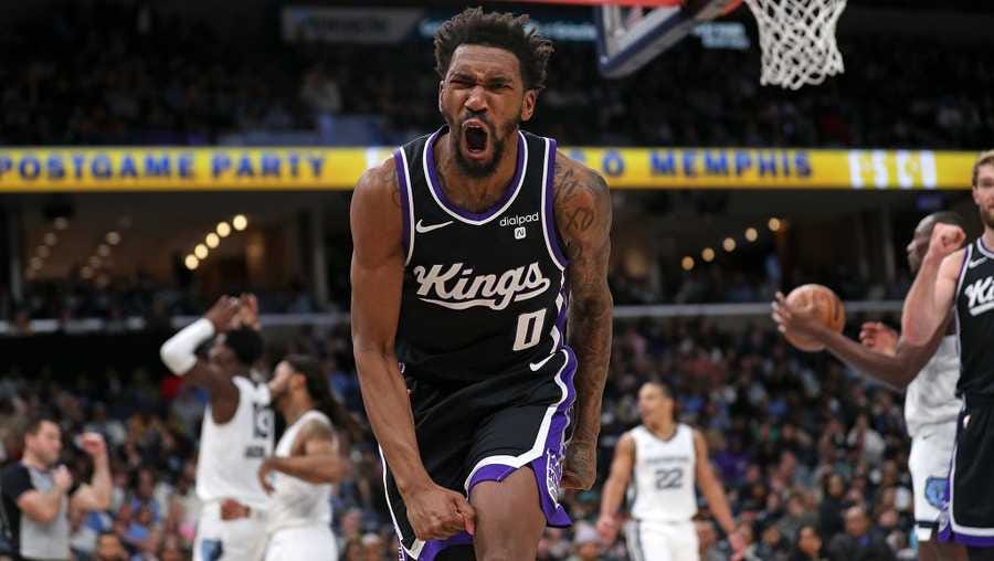 MEMPHIS, TENNESSEE - DECEMBER 31: Malik Monk #0 of the Sacramento Kings reacts during the first half against the Memphis Grizzlies at FedExForum on December 31, 2023 in Memphis, Tennessee. NOTE TO USER: User expressly acknowledges and agrees that, by downloading and or using this photograph, User is consenting to the terms and conditions of the Getty Images License Agreement. (Photo by Justin Ford/Getty Images)