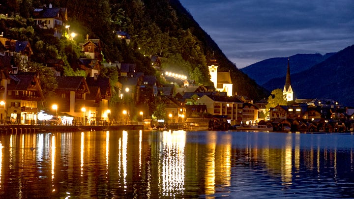 The series of images showcasing the beauty of Hallstatt in Austria from dawn to dusk.