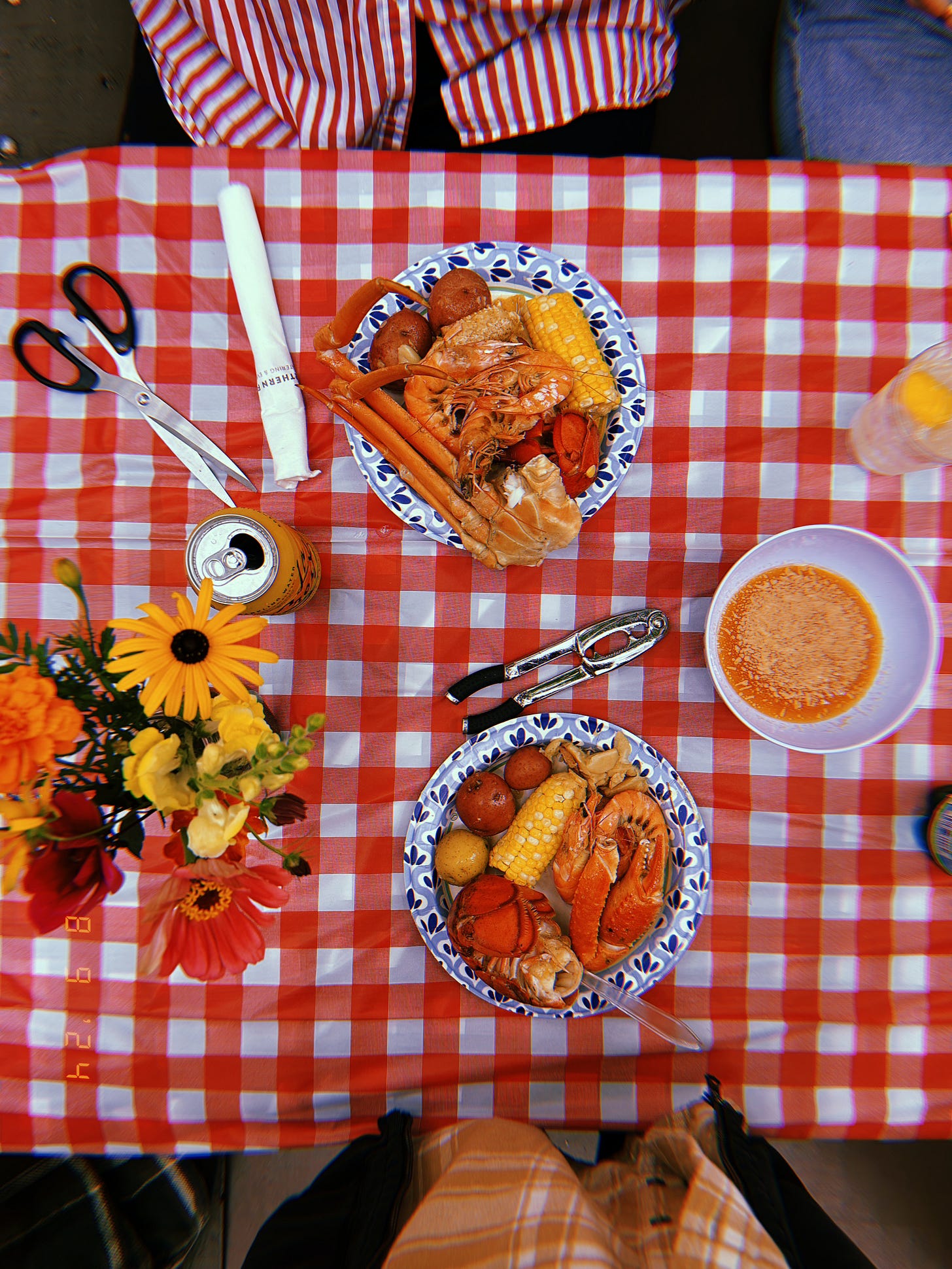 Seafood boil on a red checkered tablecloth