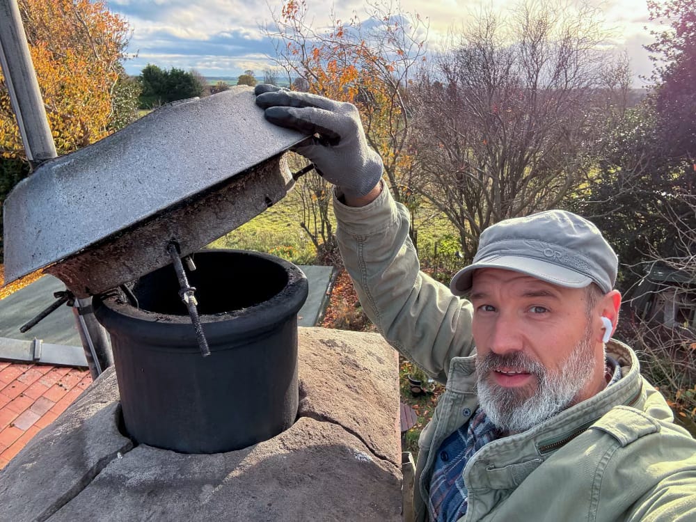 Me up a ladder fixing a neighbours chimney.