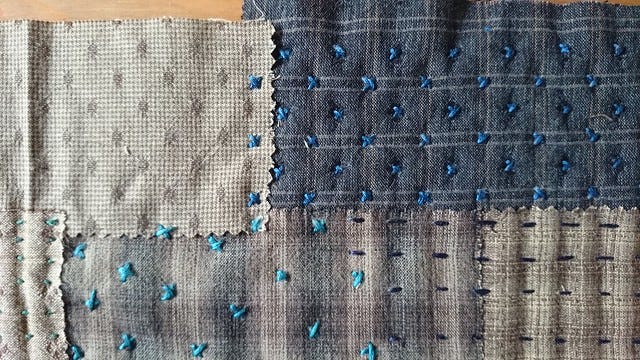 closeup of sashiko bag outer fabric closeup of sashiko bag outer fabric