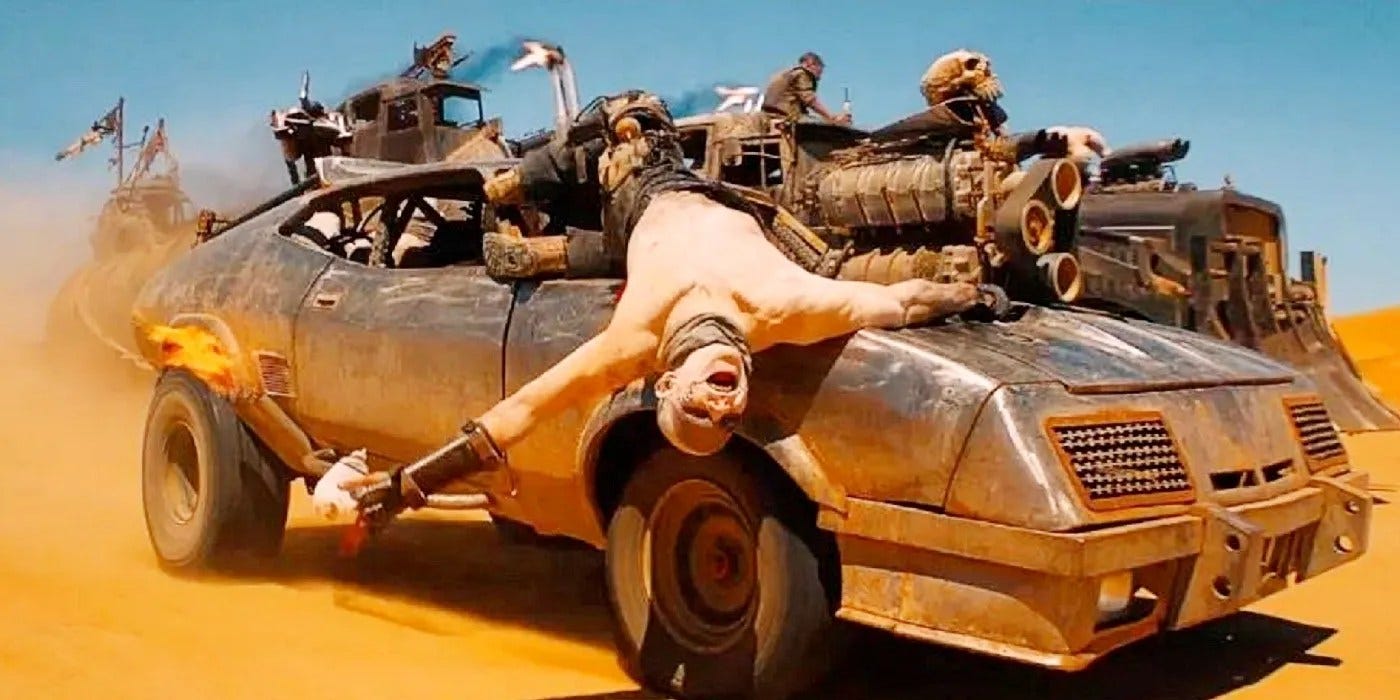 https://i0.wp.com/static1.srcdn.com/wordpress/wp-content/uploads/2022/11/Mad-Max-Fury-Road-Warboy.jpg