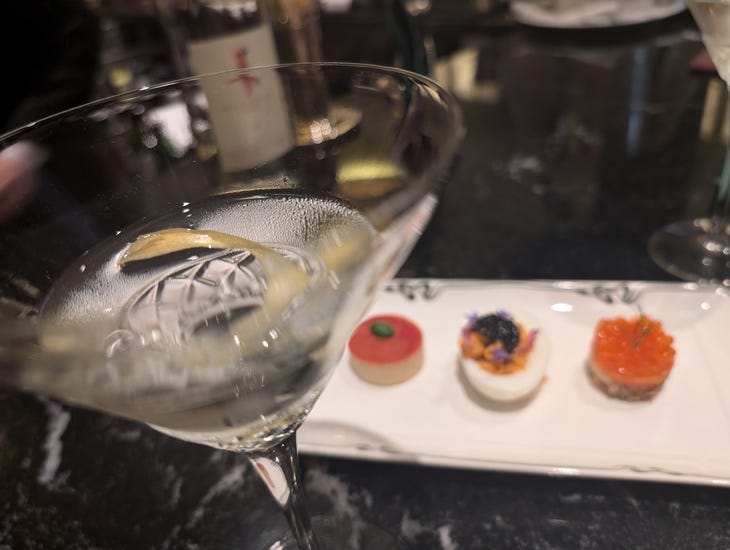 A martini with canapes A martini with canapes