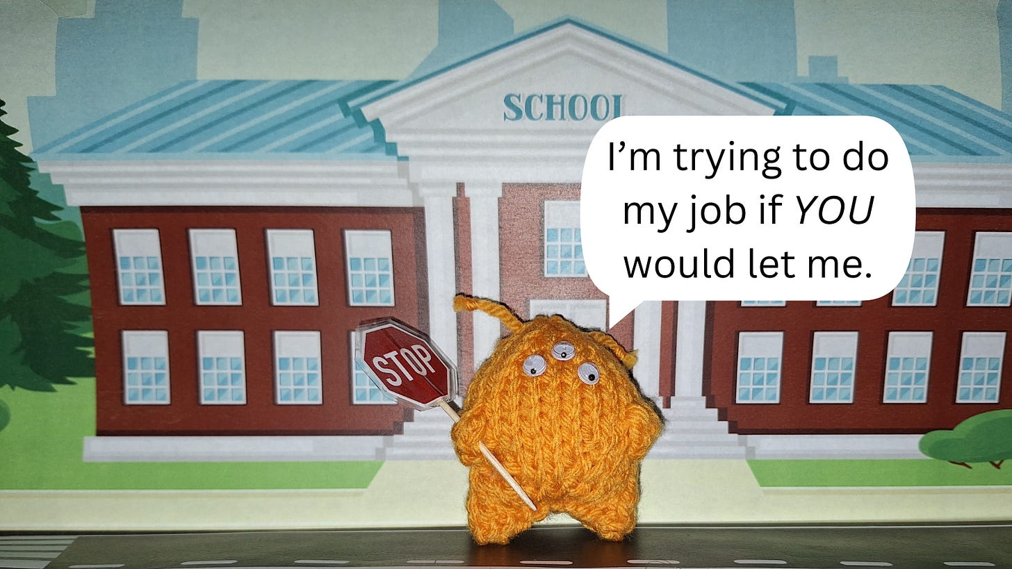 knitted alien with a stop sign. text reads I'm trying to do my job if you'd let me