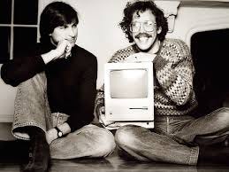 Three photos. The first is Bill Atkinson with Steve Jobs, seated on the floor, circa 1984. Bill has a big smile and is holding a Macintosh. Steve is staring at Bill, beaming. The second photo is BIll holding a photographic print, probably around 2010. The third photo is Bill circa 2024.