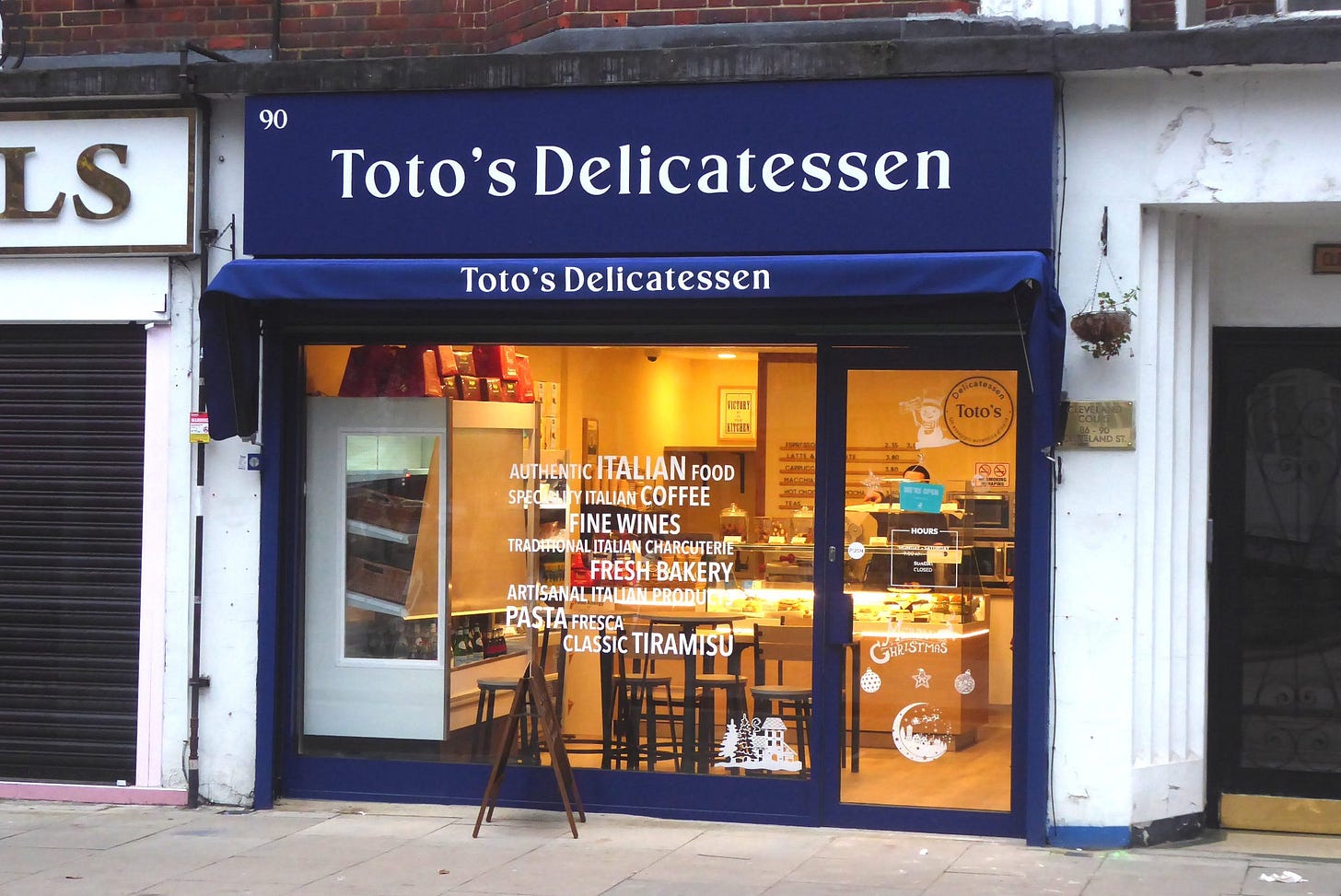 View from the street of the shopfront of a delicatessen on Cleveland Street.