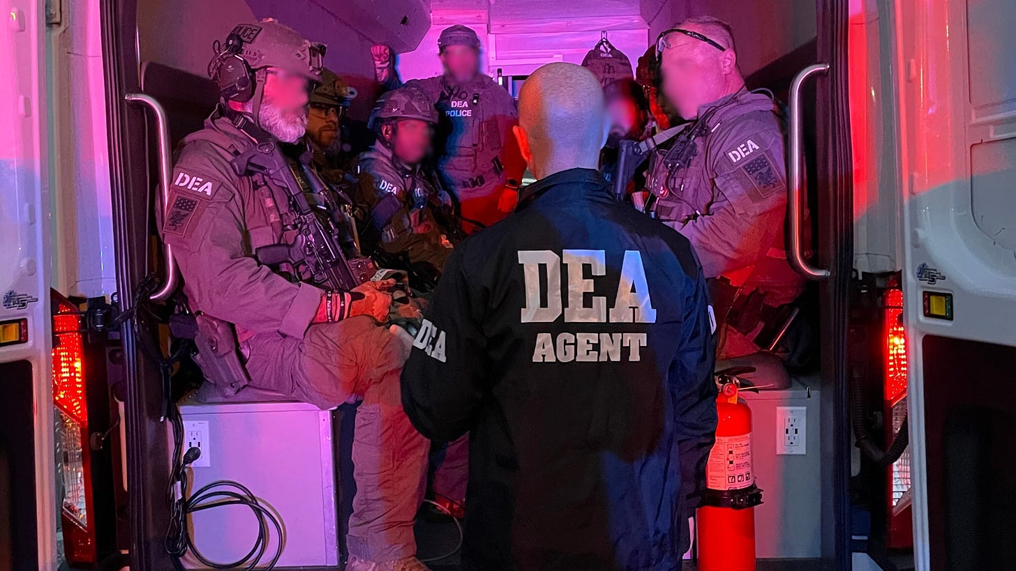 A Drug Enforcement Administration Raid Team prepares for an operation targeting the Sinaloa Cartel in Washington, DC (August 26, 2025) A Drug Enforcement Administration Raid Team prepares for an operation targeting the Sinaloa Cartel in Washington, DC (August 26, 2025)