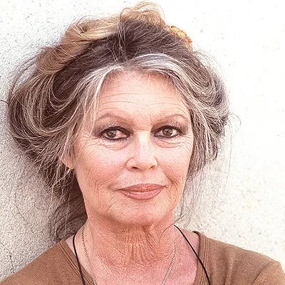 A 1982 portrait of Brigitte Bardot with natural hair and visible smile lines around her eyes and mouth, representing her honest approach to aging.