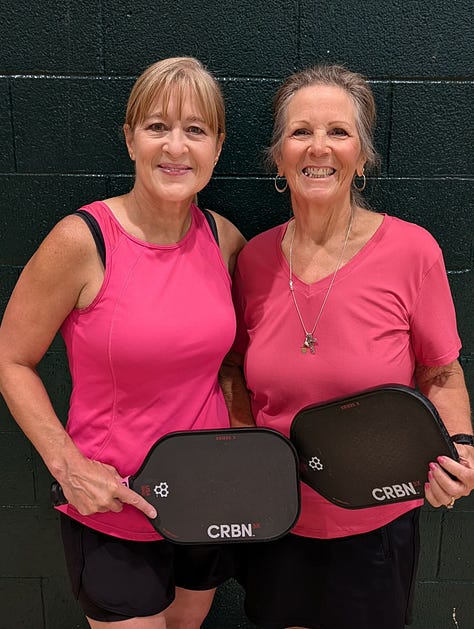 pickleball players pose and smile in Cloudcroft, New Mexico