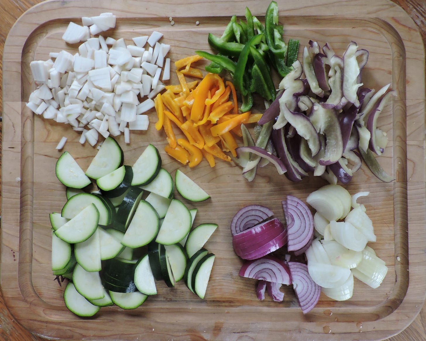  TOP: Turnips, orange, green, & purple peppers. BOTTOM: Zucchini, red & yellow onions. 